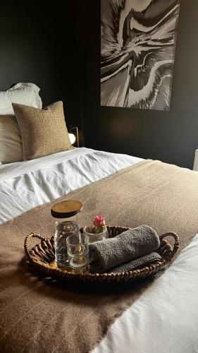 a tray of food on top of a bed at Cardiff Townhouse in Cardiff