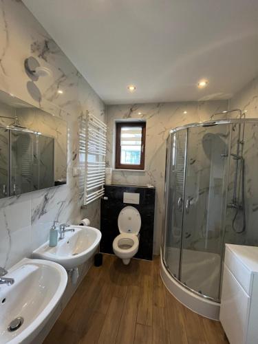 Koupelna v ubytování Aura Deluxe Apartament