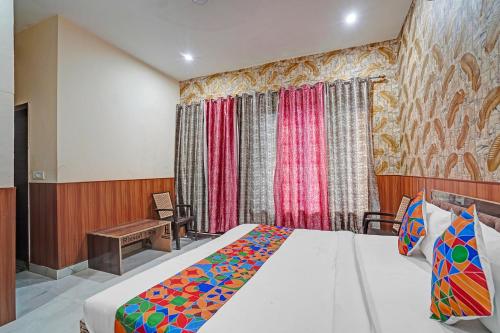 Cama o camas de una habitación en FabExpress Comfort Inn