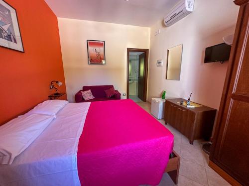 Una cama o camas en una habitación de La palma vacanze