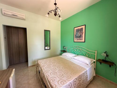 Una cama o camas en una habitación de La palma vacanze