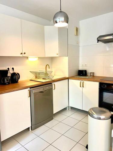 Appartement Spacieux avec jardin, à 5 min à pied de l'abbaye aux Dames et 10 min à pied du centre ville