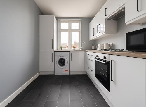 Η κουζίνα ή μικρή κουζίνα στο Beautiful 1 bed flat in Wimbledon
