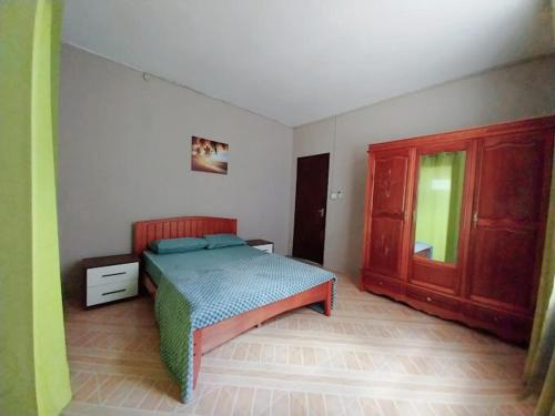 Postel nebo postele na pokoji v ubytování YUTI Style Trendy Home Vibes