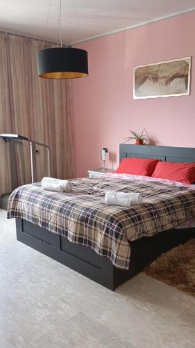 Un ou plusieurs lits dans un hébergement de l'établissement Next b&b