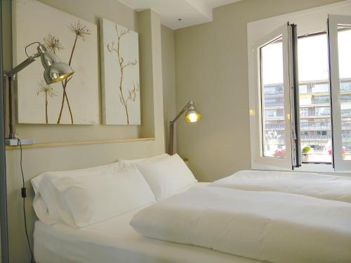Postel nebo postele na pokoji v ubytování Ferran Pedralbes Penthouse