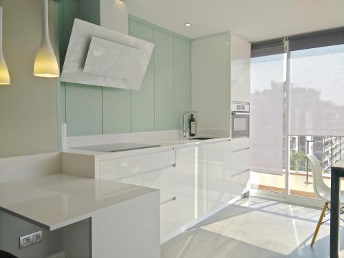 Kuchyň nebo kuchyňský kout v ubytování Ferran Pedralbes Penthouse