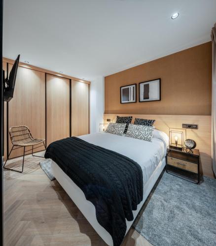 Кровать или кровати в номере Apartamentos Turísticos de Soria 36 Collado