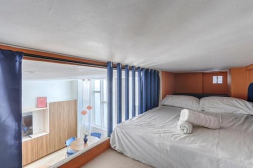 Photo de la galerie de l'établissement Chapelle Ordener Cosy Apartment Mezzanine 4P, à Paris