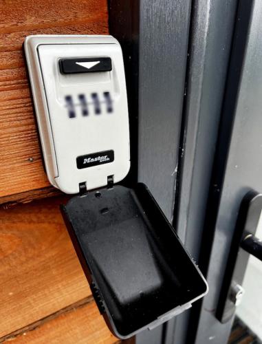 an electronic device is sticking out of a wall at The Larch in Hensol