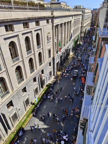 an aerial view of a street in front of a building at Altoledo Rooms and Suite in Naples