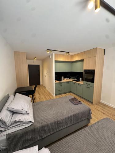 Dapur atau dapur kecil di ApartHotel Rynek Kielce