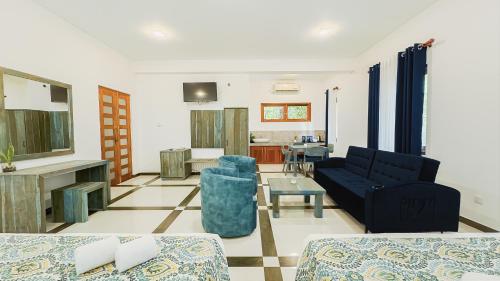 a living room with a couch and a table at Hasthi Boutique in Kandy