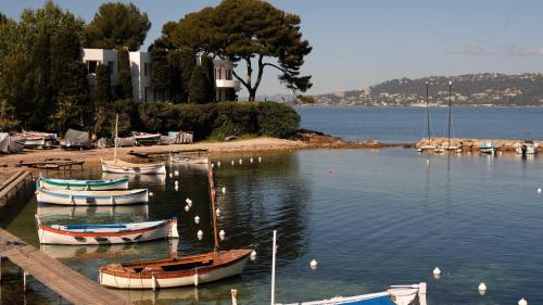 a group of boats docked in a body of water at Villa Miraé by Inwood Hotels - Cap d'Antibes in Antibes