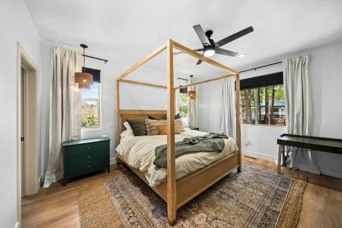 a bedroom with a canopy bed and a piano at Lake-View Gem w/ Outdoor Entertainment in Show Low in Show Low