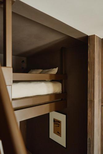 a couple of bunk beds in a room at Raibu Ghent by StayC in Ghent