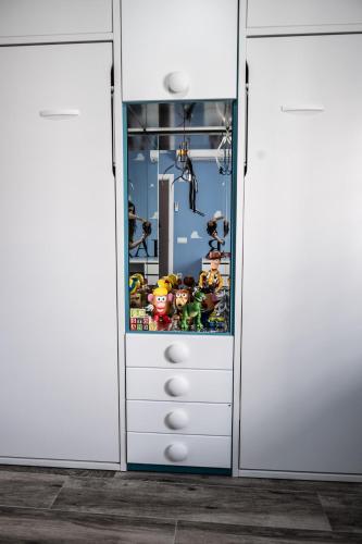 a door into a room with a lego game at Casa Los Cantos Gordo's in Daimiel