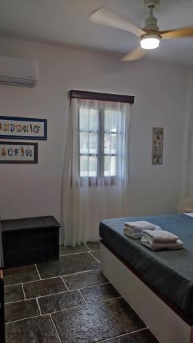 Katil atau katil-katil dalam bilik di Thimari villas