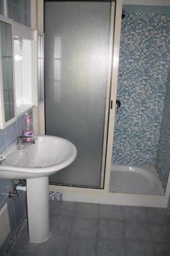 a bathroom with a sink and a shower at Agriturismo Piccolo Paradiso in Piano di Sorrento