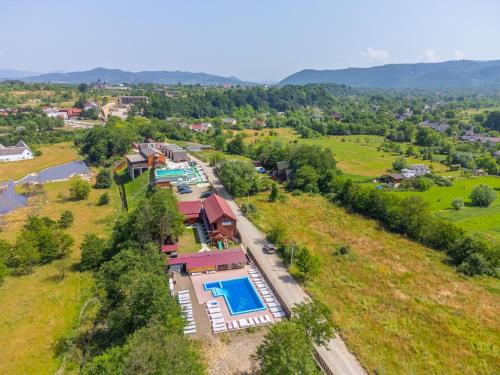 an aerial view of a resort with a swimming pool at Dana NEW 2025 in Solotvyno