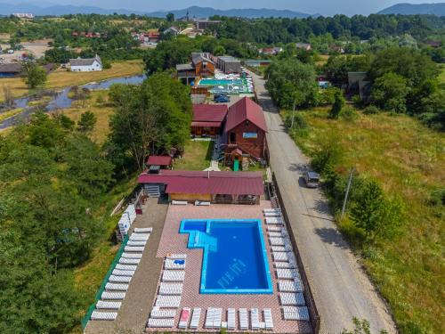 an aerial view of a resort with a swimming pool at Dana NEW 2025 in Solotvyno