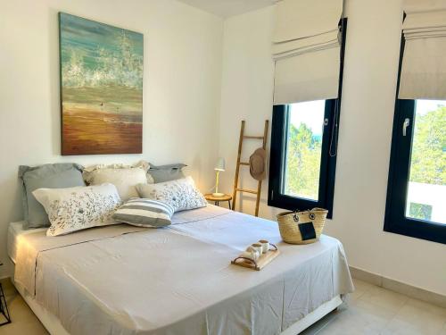 Ένα ή περισσότερα κρεβάτια σε δωμάτιο στο AMARIA Villa