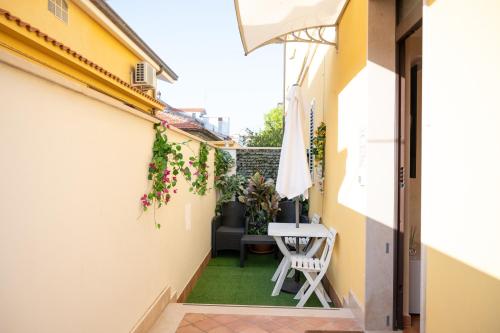 Patio nebo venkovní prostory v ubytování DailyHome - Villetta con Patio Privato a Due Passi dal Mare