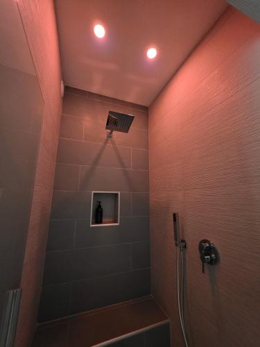 a bathroom with a shower with a shower at Light Charme, Sun Light Apartment a due passi dalla PIAZZA DUOMO in Terrasini