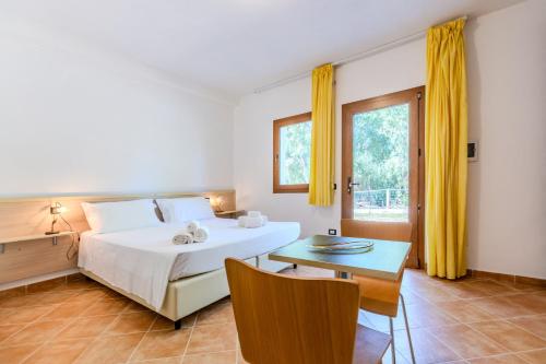 Ένα ή περισσότερα κρεβάτια σε δωμάτιο στο Iglesias Countryside, Nature & Pool