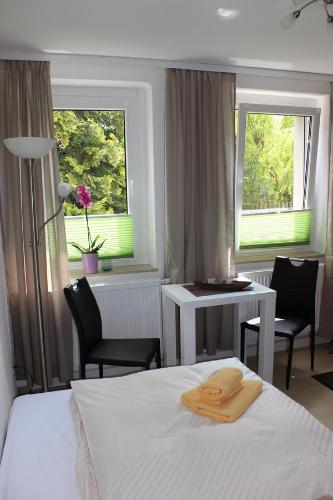 Postel nebo postele na pokoji v ubytování Weber Apartments
