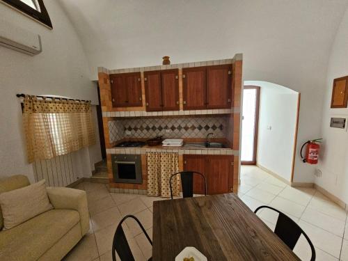 Kuchyň nebo kuchyňský kout v ubytování Casa Merlino