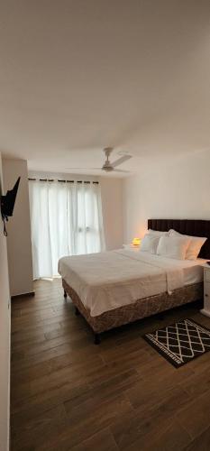 Llit o llits en una habitació de tm apartment