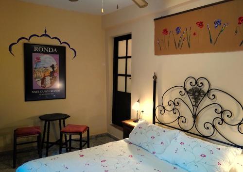 Postel nebo postele na pokoji v ubytování Baraka Boutique Pensión