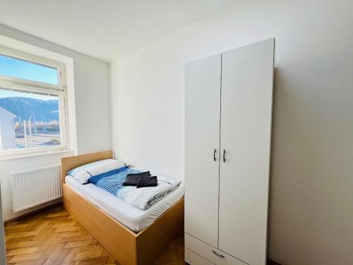 Postel nebo postele na pokoji v ubytování Leoben Top 6