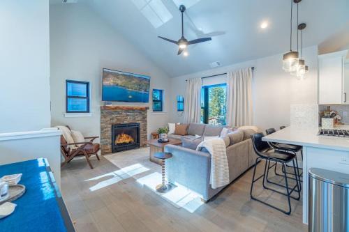 a living room with a couch and a fireplace at Elegant Tahoe Escape Comfort and Style Combined in Glenbrook