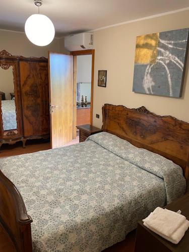 Postel nebo postele na pokoji v ubytování Il cortile da Tania