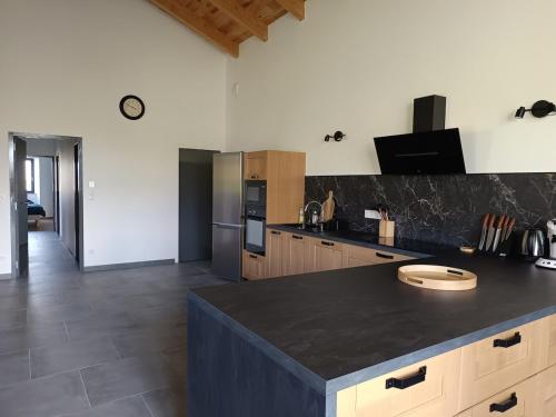 Dapur atau dapur kecil di Ancienne grange rénovée