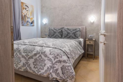 Una cama o camas en una habitación de Moet Apartment free private parking
