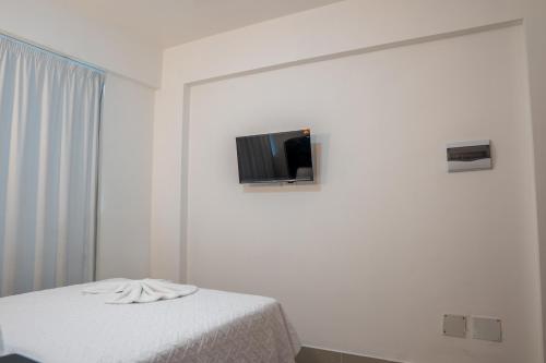 TV a/nebo společenská místnost v ubytování Hostal Gran Real Punta Cana