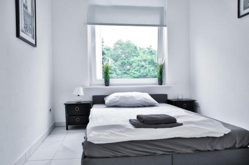 Voodi või voodid majutusasutuse Nord-Apartment 2 I 2 Zimmer mit WLAN & Fußbodenheizung toas