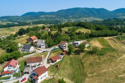 an aerial view of a village on a hill with houses at Kuća za odmor Zora in Bregi Radobojski