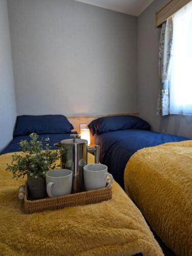 Letto o letti in una camera di Coastal Getaway - Free Activities & Beach Access