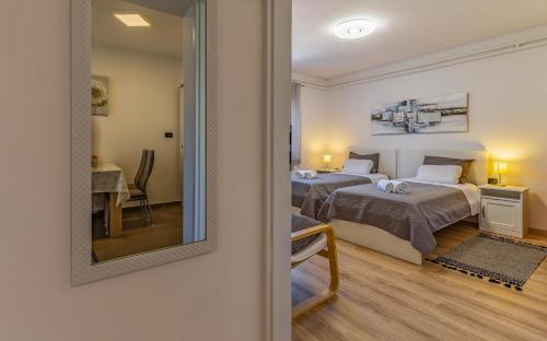 Posteľ alebo postele v izbe v ubytovaní Apartment Mar