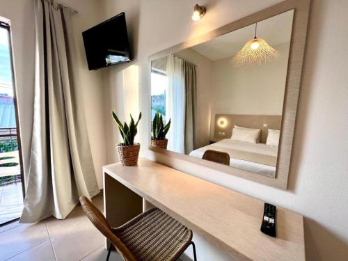 Ένα ή περισσότερα κρεβάτια σε δωμάτιο στο Amare Apartments