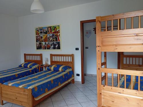 A bed or beds in a room at AGRITURISMO Cré Seren