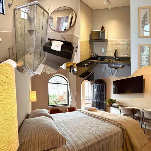 a bedroom with a large bed and a bathroom at Pousada da Matriz - Perdões MG in Perdões