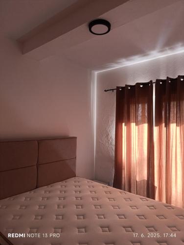 Postel nebo postele na pokoji v ubytování Apartman Vuk