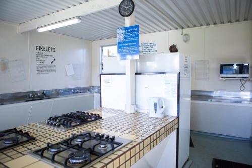Dapur atau dapur kecil di Mercury Bay Holiday Park