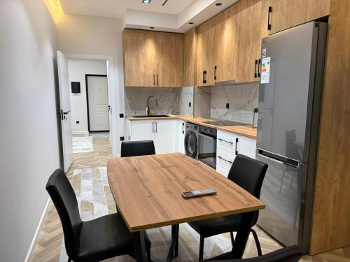 Kuchyň nebo kuchyňský kout v ubytování HomeSweet