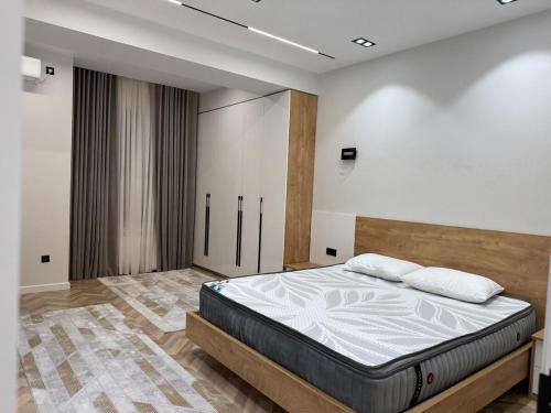 Postel nebo postele na pokoji v ubytování HomeSweet